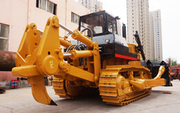 Maquinaria pesada bulldozer nivelando terreno de gran escala
